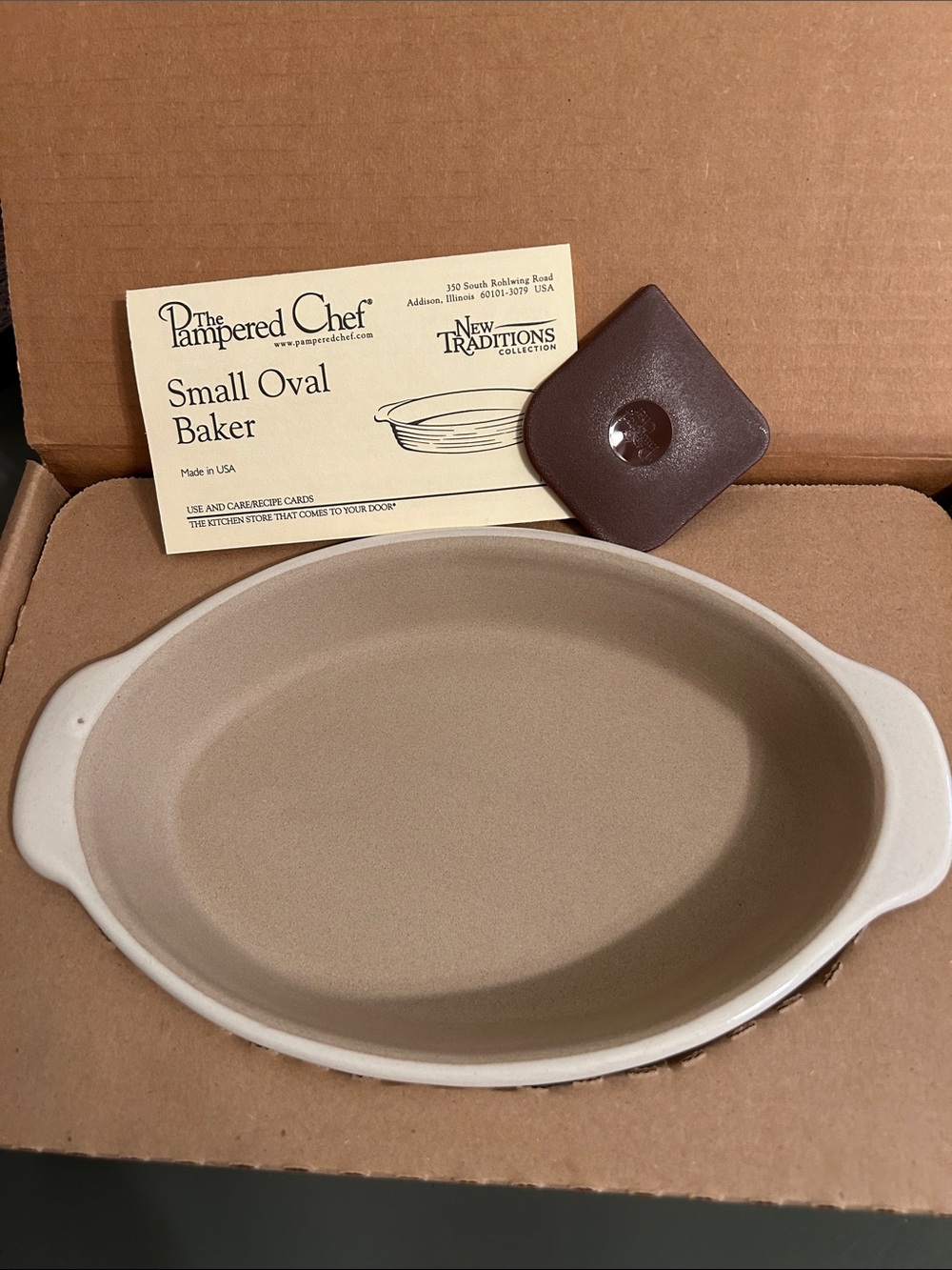 NWT The Pampered Chef Small Oval Baker in Beige and Brown.  New in box.